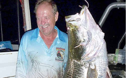 Denis Harrold with a pending world record barramundi caught at Lake Monduran. Denis Harrold with a pending world record barramundi caught at Lake Monduran.